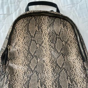 Animal print luxury back pack/ purse